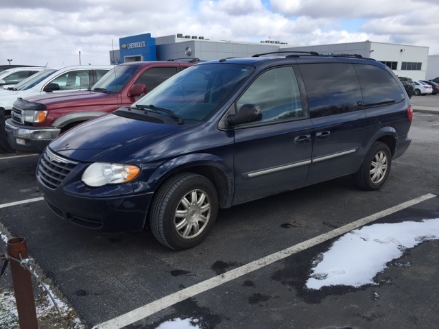 Pre owned chrysler town and country van